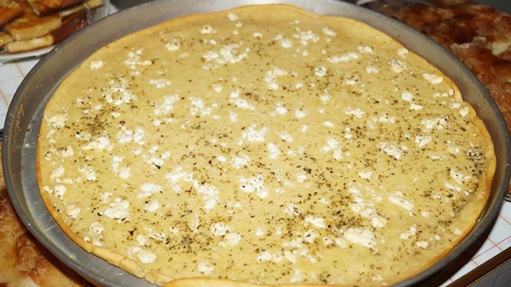 Πρωτοχρονιά: Τα έθιμα της Ηπείρου-Βασιλόπιτα με τυρί