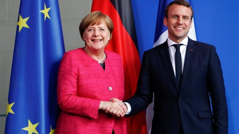 Άμυνα και διατλαντικές σχέσεις στο επίκεντρο της συνάντησης Μακρόν-Μέρκελ
